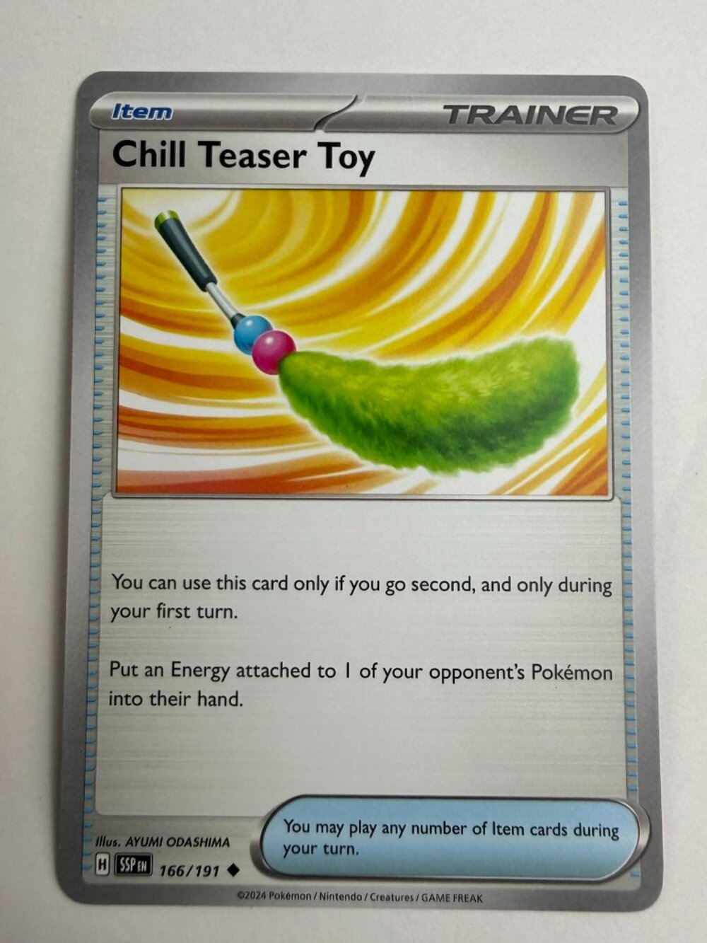 #166/191 Chill Teaser Toy Normal Uncommon Pokémon S&V Surging Sparks English NM